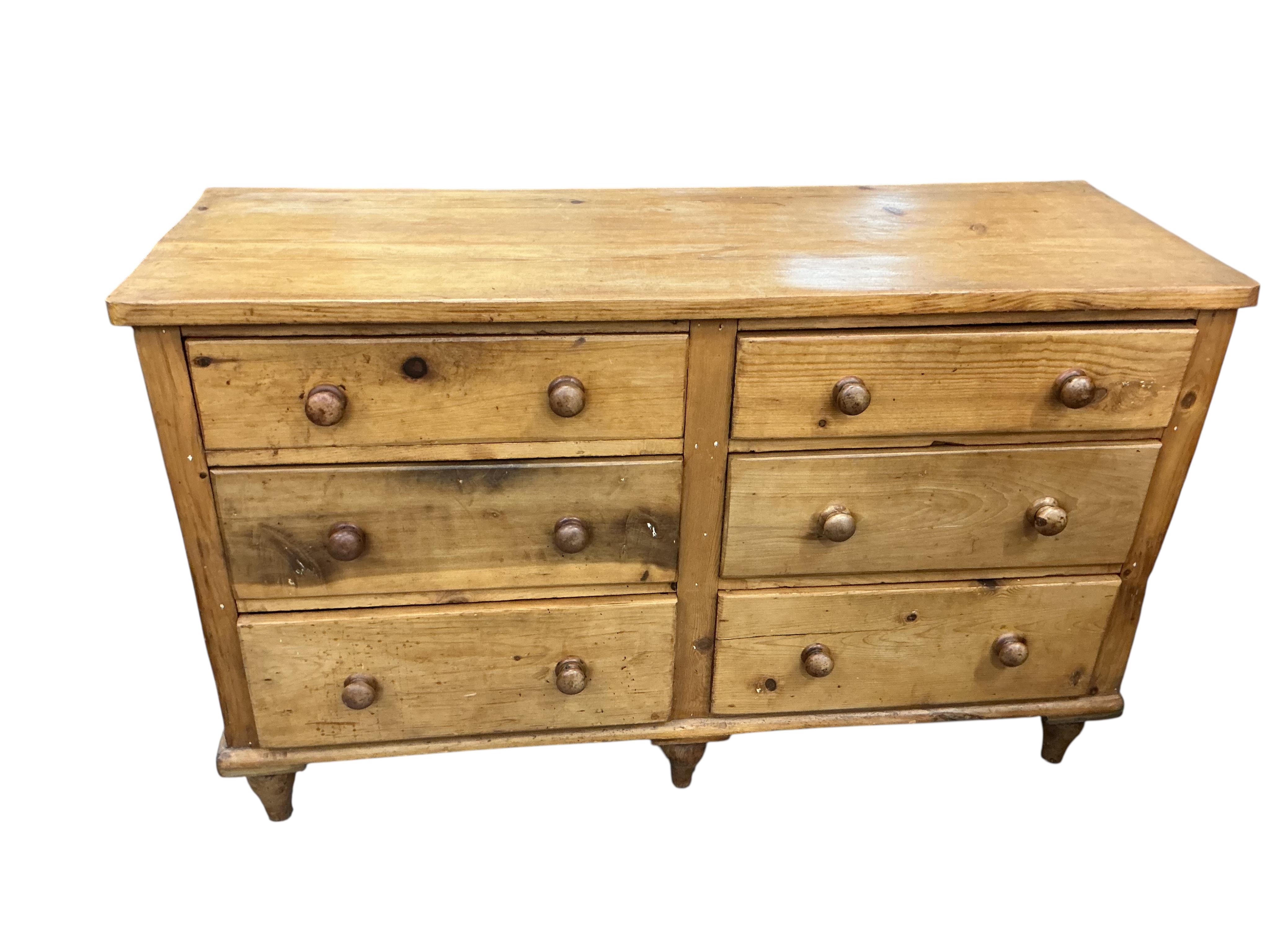 A late Victorian pine six drawer low dresser, width 132cm, depth 47cm, height 82cm